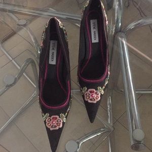 Steve Madden black with sequence embedded